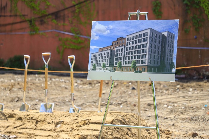 rendering of marcus garvey apartments at construction site