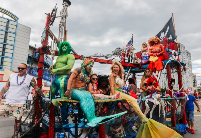 people pose at 2022 coney island mermaid parade
