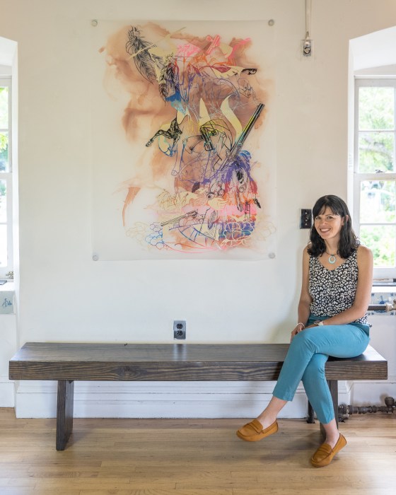 curator of old stone house exhibit