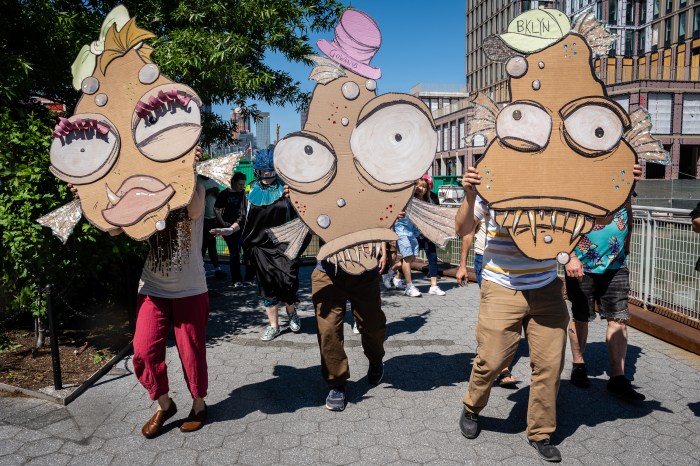 gowanus art parade people in fish costumes
