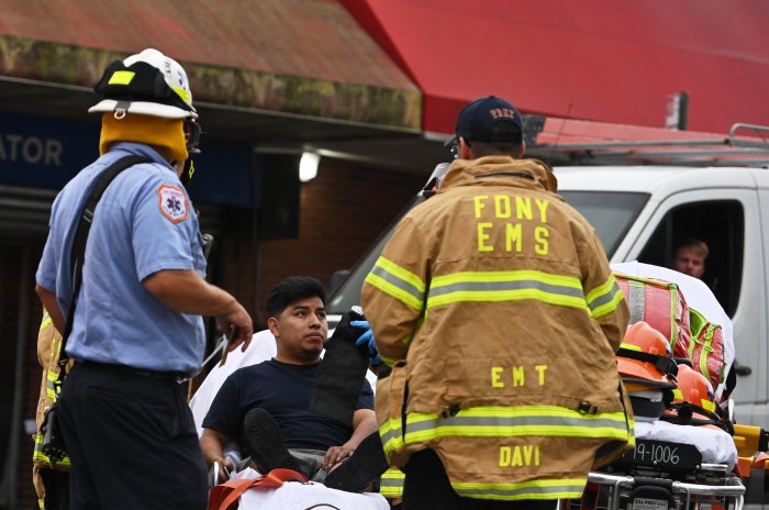 midwood battery fire man in gurney