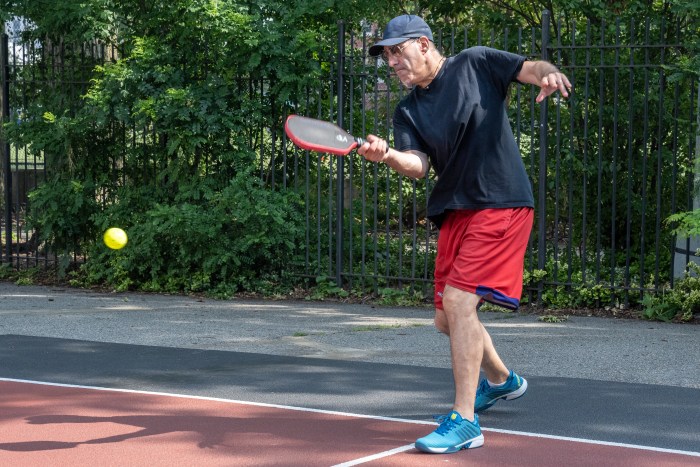 man playing pickleball