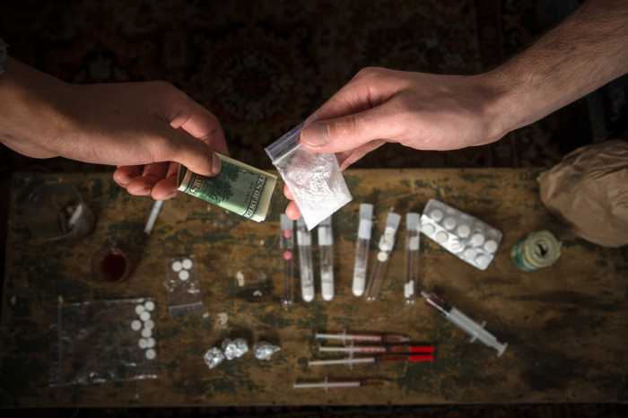 person handling contraband prison