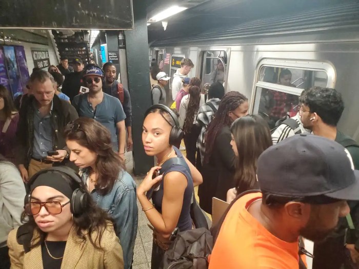 riders on g train platform