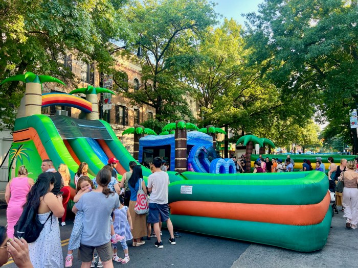 Locals jump into the fun during the street festival.