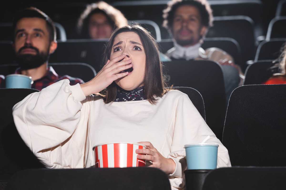 woman shocked in movie theater brooklyn horror film festival