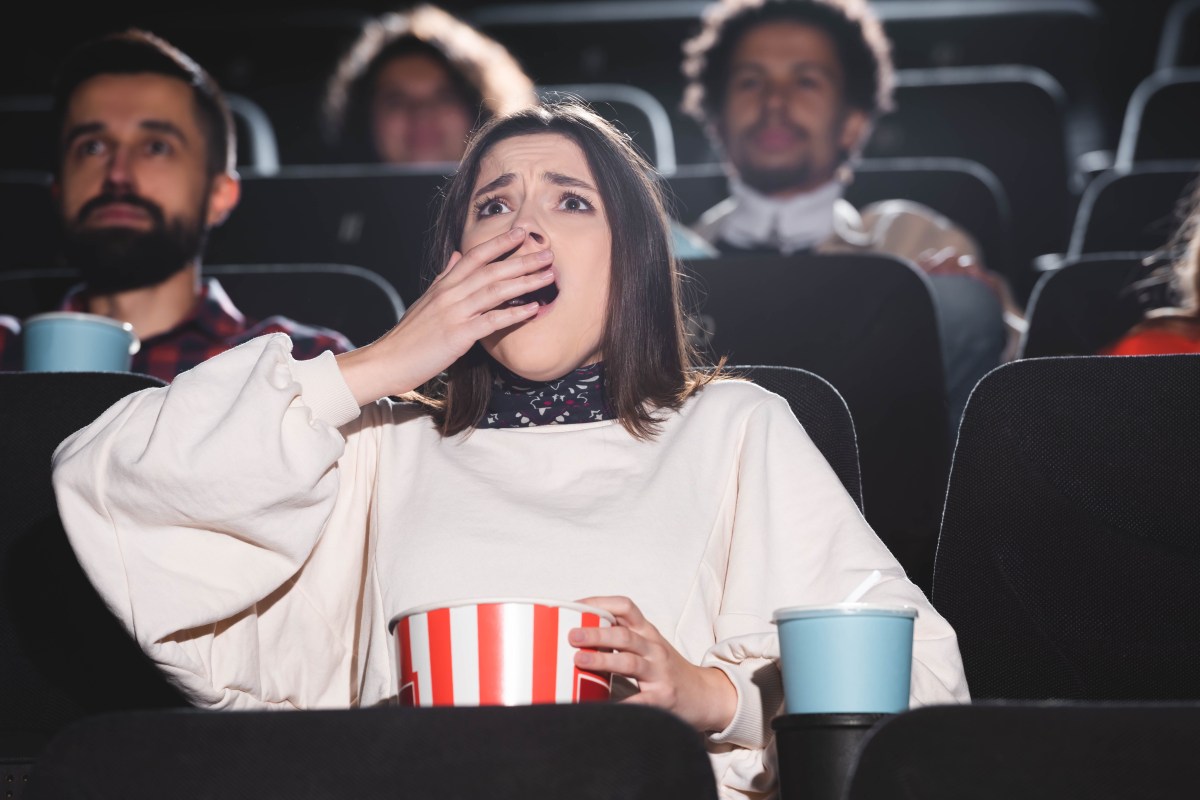 woman shocked in movie theater brooklyn horror film festival