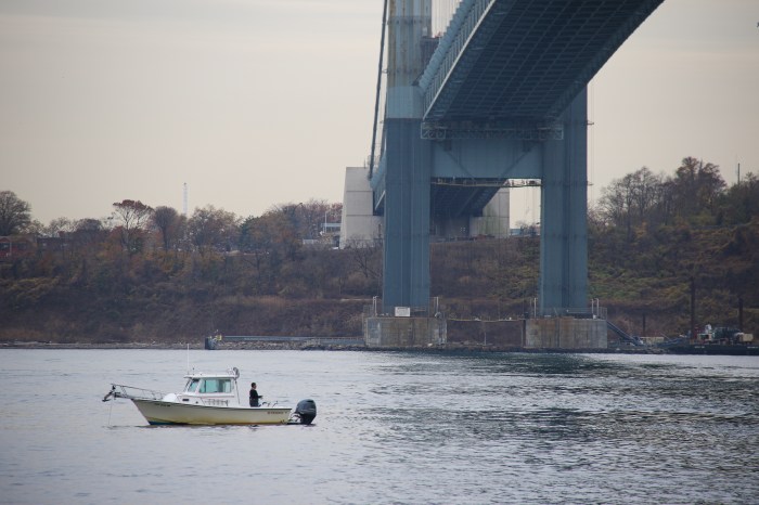 boat by foot of verrazzano bridge