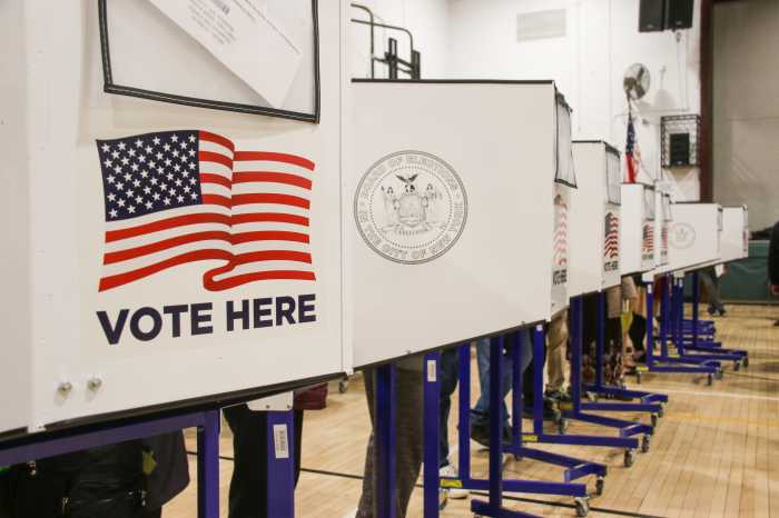 voters in voting booths