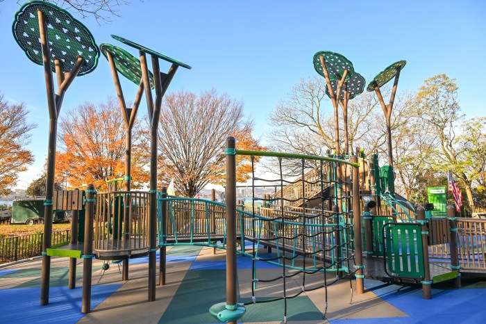 The renovated playground features new equipment and a larger play space