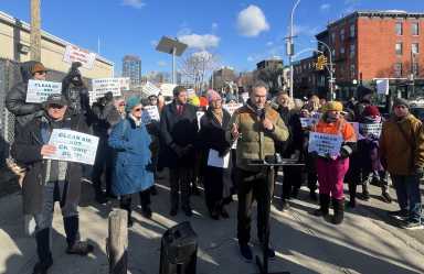 rally outside columbia street waterfront district concrete recycling