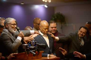 mayor eric adams with prayer leaders in Brooklyn