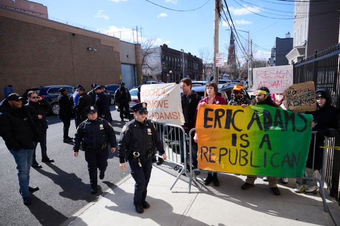 protestors outside mayor eric adams rally at ocean hill church