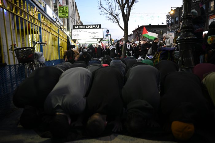 men praying outside bay ridge mosque