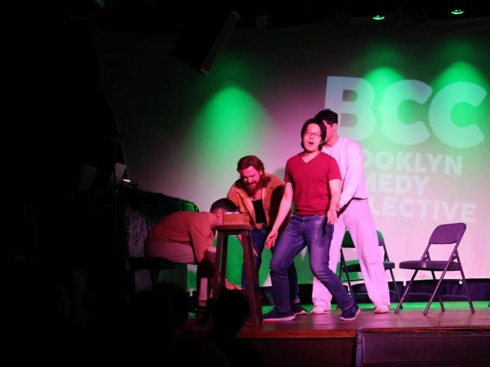 people on stage at secret's out musical