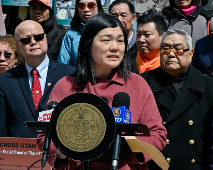 zhuang speaking at press conference