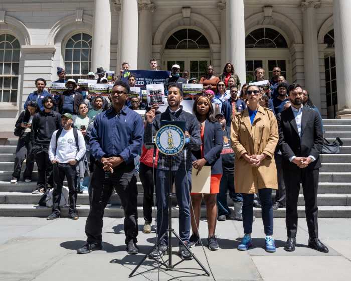 deed theft rally at city hall