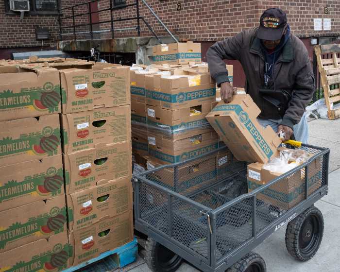 person unloading food banks donations