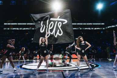 brooklynettes dance team on basketball court
