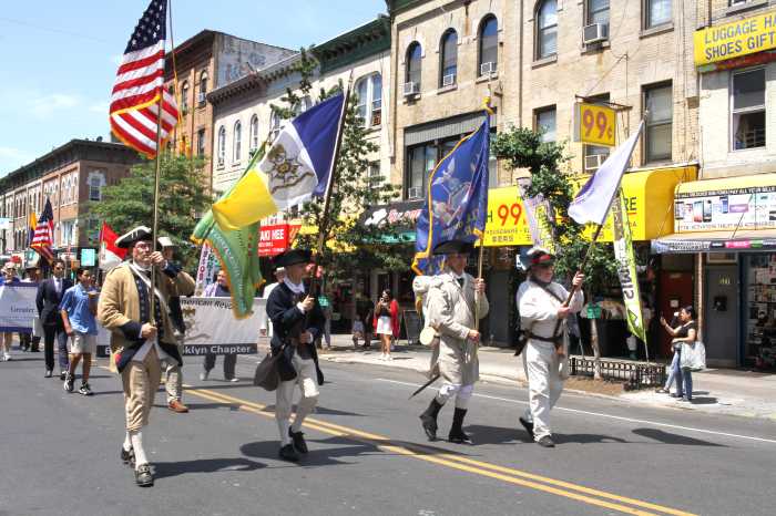 people marching in independence day parade