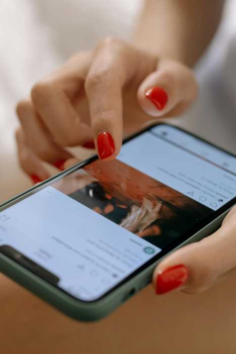 person scrolling on phone