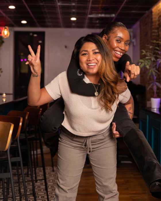 whisk & whiskey co-founders pose