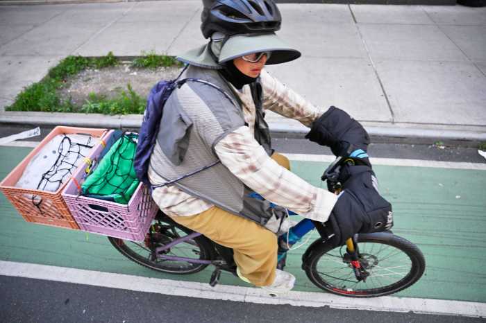 biker in bedford avenue bike lane