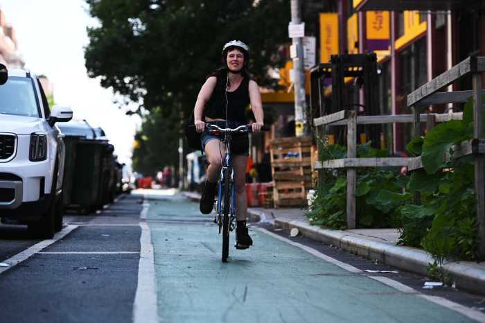 person in bedford avenue bike lane
