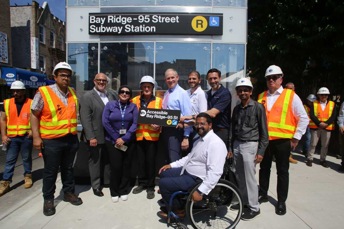 people at opening of elevators at bay ridge-95th street station