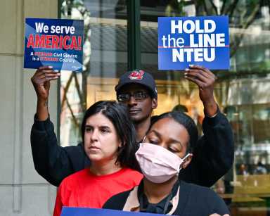 IRS workers rally in Brooklyn