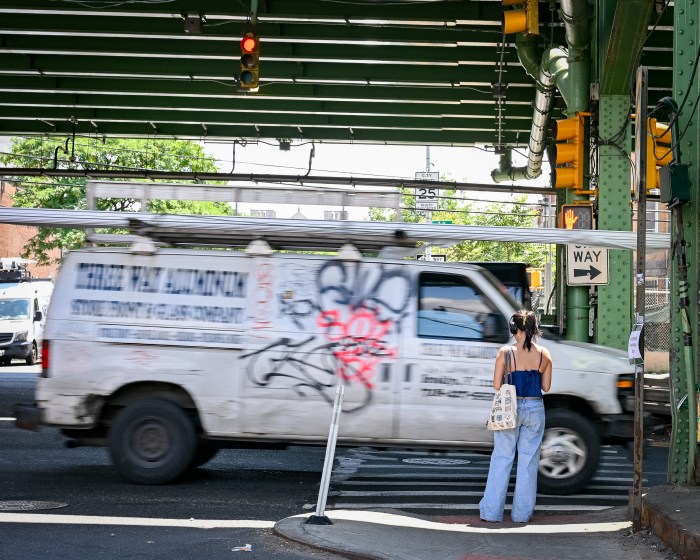 truck driving on third avenue