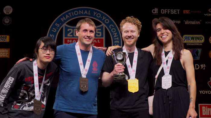 man with trophy is crowned winner of the 3A division of the Us National Yoyo Championships