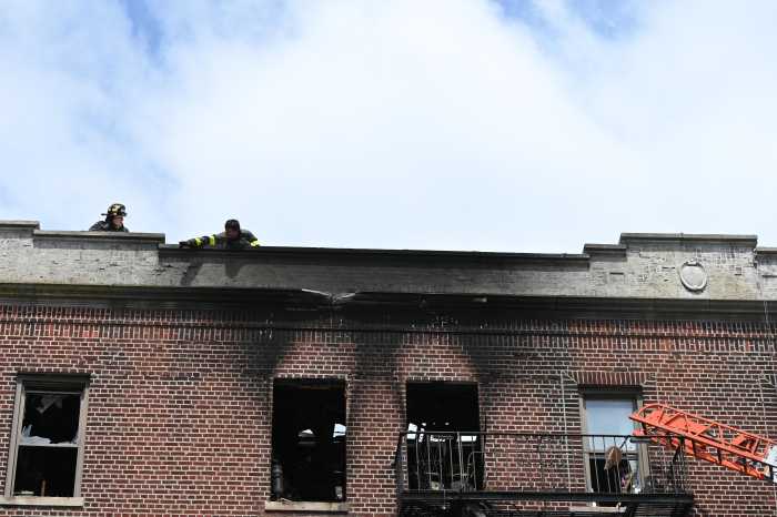 firefighters on roof of bath beach apartment building