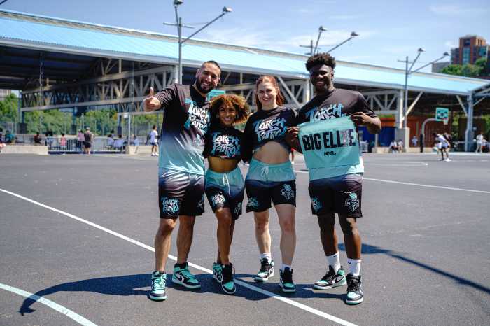 people pose at liberty fan fest