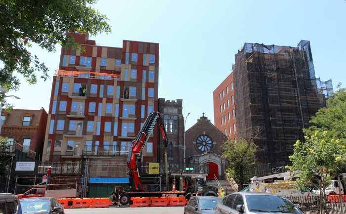 apartment buildings beside bushwick avenue church