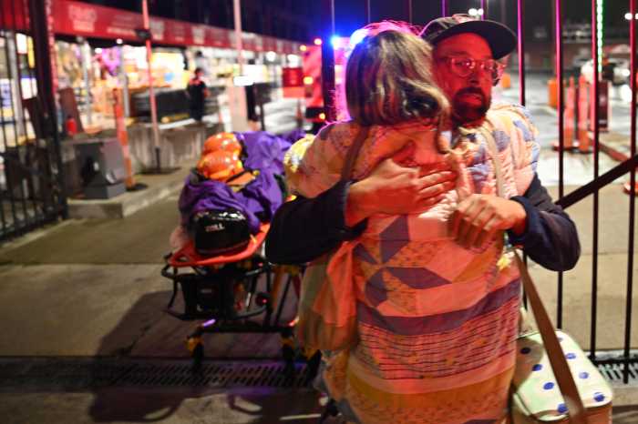 people hug red hook fire
