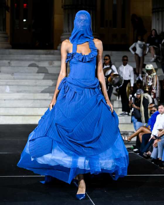 model in blue outfit