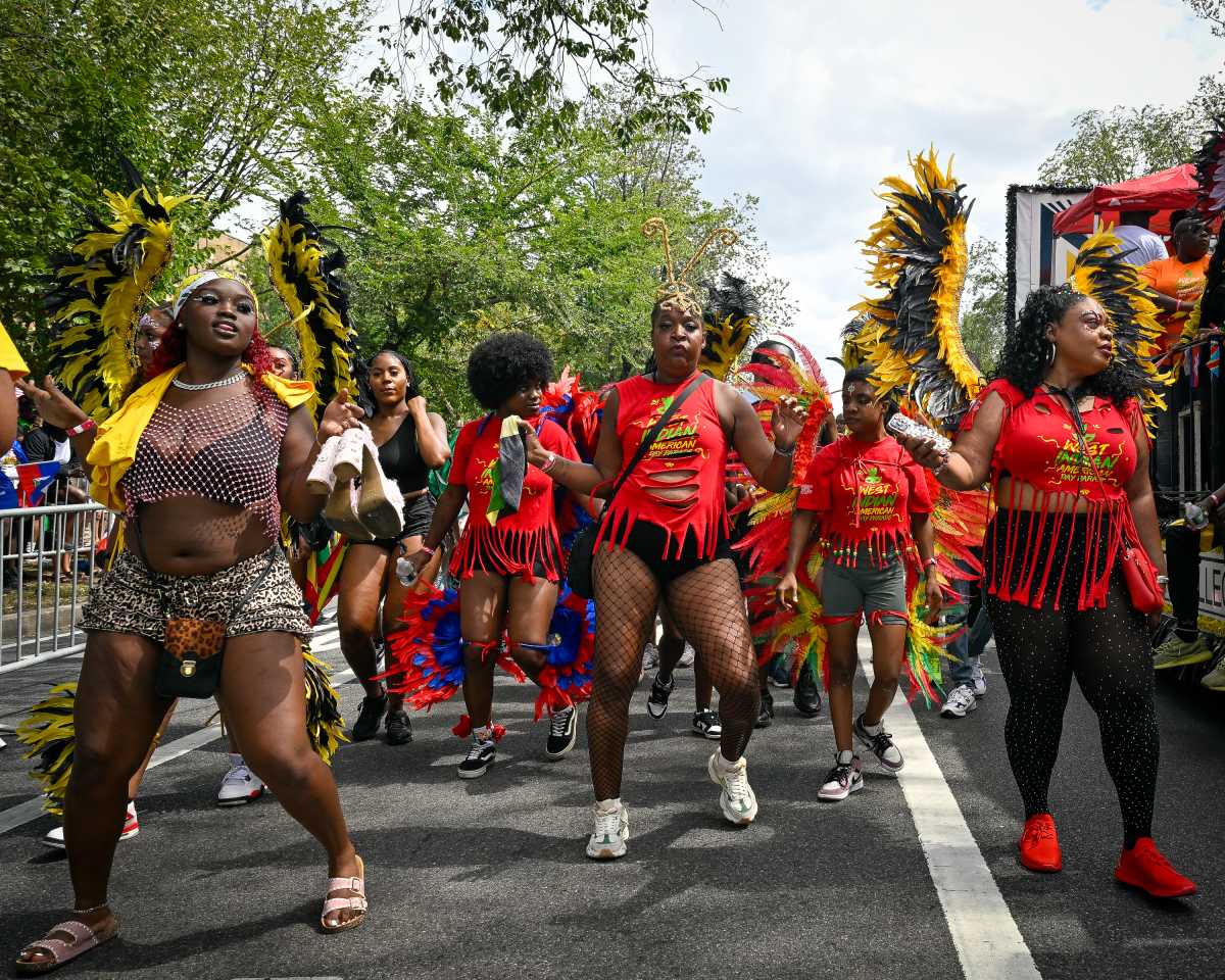 people dancing in west indian day parade