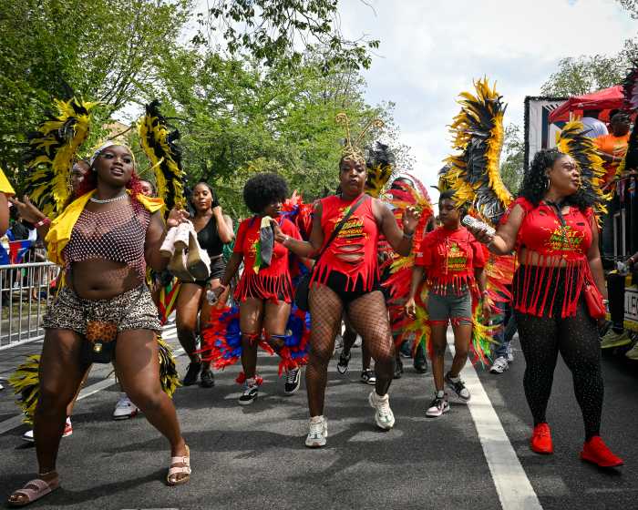 people dancing in west indian day parade