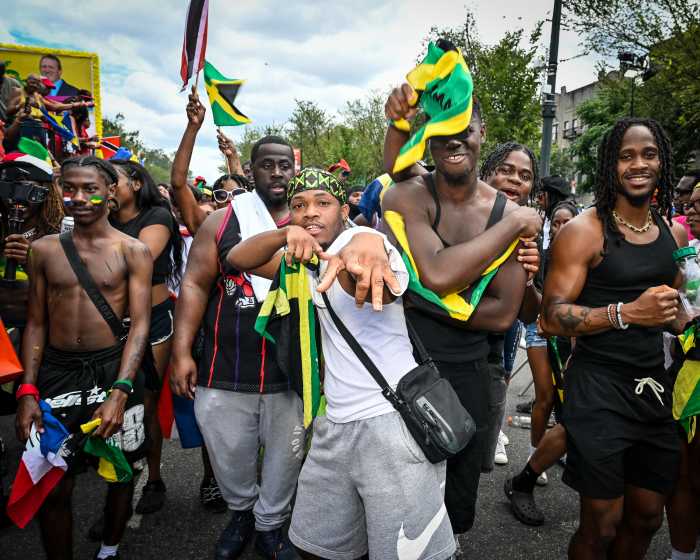 group pose at west indian day parade 