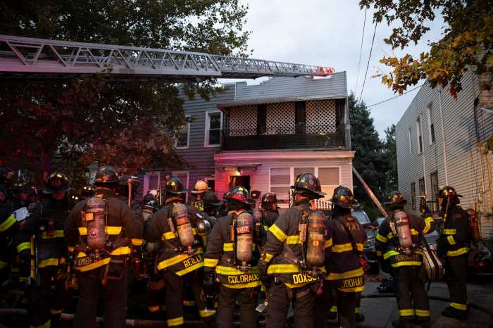 firefighters outside east new york collapse