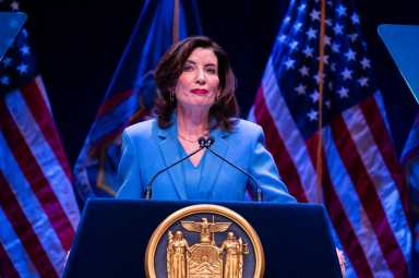 kathy hochul at podium state of the stste