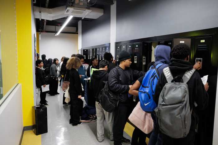 students at lockers in new achievement first building