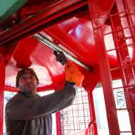 man working on wonder wheel at deno's wonder wheel park