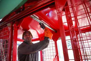 man working on wonder wheel at deno's wonder wheel park